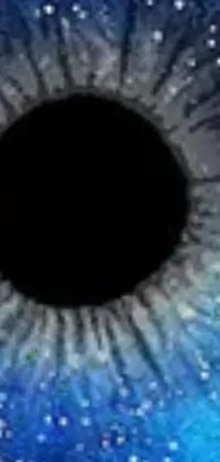 This smartphone live wallpaper depicts a striking blue eye with a square black pupil at its center