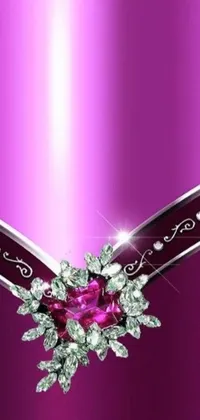 This stunning live wallpaper is a close-up of a diamond necklace set against a purple background