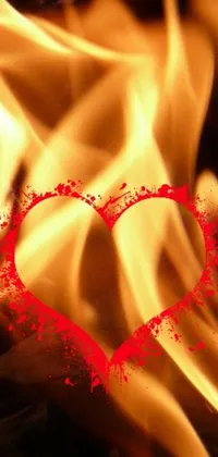 This phone live wallpaper features the stunning close-up of a fiery heart symbolizing love and passion