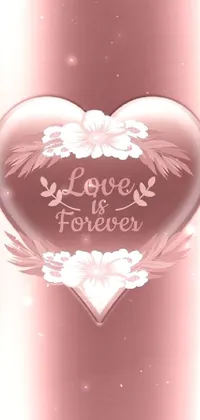 This live wallpaper features a stunning and delicate glass heart with the romantic message "love is forever" written on it