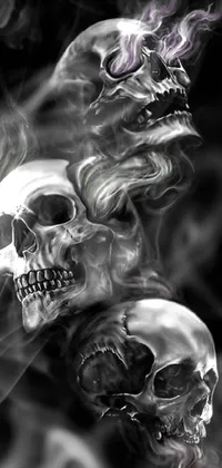 Add some spooky flair to your phone with this <a href="/">live wallpaper</a> featuring three skulls emitting smoke! Hand-drawn with pencil and painted with unique colors, it&#39;s perfect for those who love edgy art