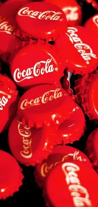 This live wallpaper showcases a 3D pile of Coca-Cola cans with bubbles floating to the surface on a gradient red and white background