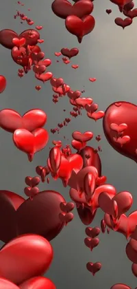 Looking for a stunning phone live wallpaper? Check out this incredible design! It features a beautiful display of red hearts, balloons, and confetti pieces, all floating gracefully across your screen