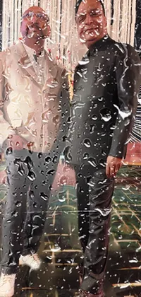 This phone live wallpaper features a duo of men dressed in a traditional Jodhpuri suit, standing next to each other at a party