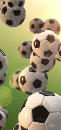 This phone live wallpaper features an animated group of soccer balls flying through the air, rendered in bright colors and toon-style graphics
