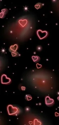 Enhance your mobile’s appearance with this romantic phone live wallpaper! The design portrays a black background with a bunch of intricately detailed hearts, giving them a realistic look