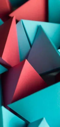 This animated live phone wallpaper features folded origami paper in shades of blue and red