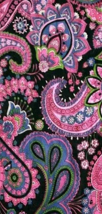This live wallpaper boasts a captivating close-up of a paisley pattern on a black background