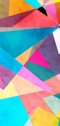This live wallpaper features a close-up shot of a modern cellphone on a table, displaying gorgeous geometric abstract art