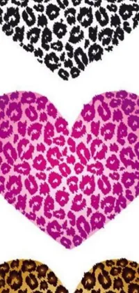 This live wallpaper for your phone features four different leopard print heart designs on a white background with pink coloring