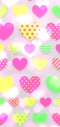 This live wallpaper boasts a colorful and fun design of heart-shaped stickers that pop against a white base