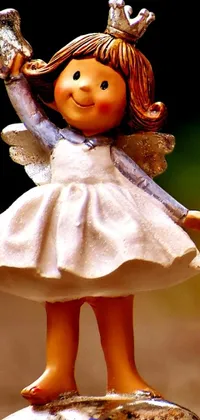The phone live wallpaper is a captivating, detailed close-up of a figurine of a little girl that dances and smiles