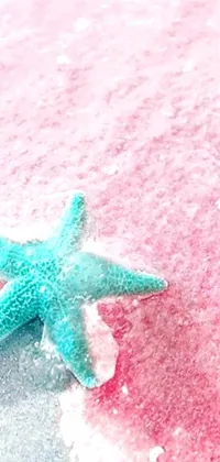 Looking for a stunning live wallpaper to elevate your phone's appearance? Look no further than this breathtaking image of a hyperdetailed starfish on a sandy beach