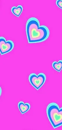 This lively phone live wallpaper features a bright pink background adorned with colorful heart graphics in a style inspired by popular Tumblr trends and playful designs reminiscent of old VHS footage