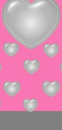 This lively phone live wallpaper features a fun, playful design of silver hearts on a slick pink armor-like background
