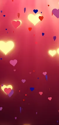 Looking for a stunning live wallpaper for your phone? Look no further than this beautiful heart-themed design! This high-quality, 4k image is sure to impress, with a dreamy mix of red, purple, and yellow hearts floating across your screen