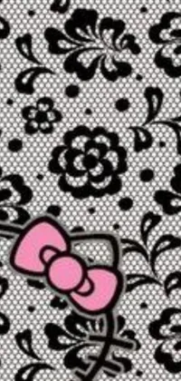 This live wallpaper showcases a lovable character, Hello Kitty, featuring a pink bow and black lace on an industrialpunk-inspired background with a papier-colle design
