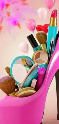 This live wallpaper features a vibrant pink high heeled shoe filled with playful and colorful makeup, brushes, and lipstick set against a black background with flickering lights for an edgy and glamorous feel