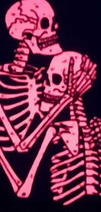 This live phone wallpaper features skeletons in a closeup view