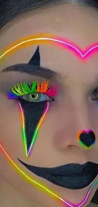 This phone live wallpaper features a brightly-colored close-up of a figure with neon-inspired makeup