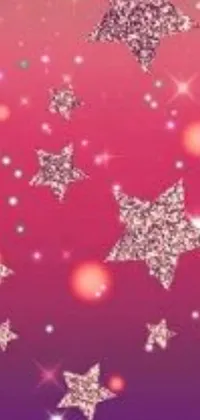 This stunning live wallpaper features a digital illustration of stars in the sky against a gradient pink background