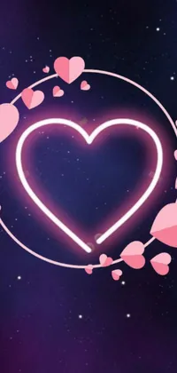A mesmerizing phone live wallpaper featuring a glowing neon heart surrounded by smaller hearts in various colors on a deep purple background