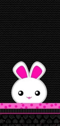 Decorate your phone screen with this charming live wallpaper featuring a cute white rabbit with pink ears peeking out of a window