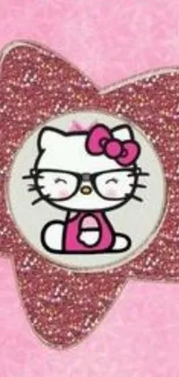 This phone live wallpaper is a charming depiction of a bright and playful hello kitty pin against a soft pink background