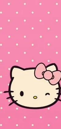 This is a playful pink Hello Kitty live wallpaper designed with polka dots, a pop art-inspired picture, and Tumblr typography
