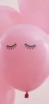 "Add a cute and playful touch to your phone with this pink balloon live wallpaper