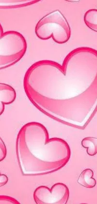 Add some color to your phone with this pink live wallpaper featuring hearts in various sizes and shades