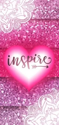 Presenting a live wallpaper that exudes delightful charm - a pink heart with the word "inspire" in black ink, rendered on a background of dainty pink and white shades, and enhanced with an additional pink heart