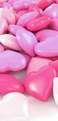 Looking for a fun, playful phone wallpaper that showcases your love for everything pink and girly? Check out this digital rendering featuring a pile of pink and white hearts set against a clean, white background