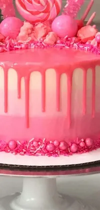 This vibrant phone live wallpaper showcases a closeup view of a detailed pink cake resting on a white cake plate