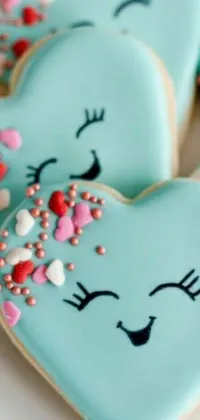 This live wallpaper for phones features a delightful display of heart-shaped cookies with colorful sprinkles and heart designs