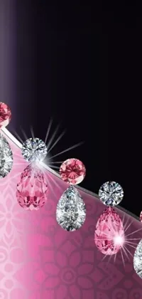 This phone live wallpaper features a digital art display of sparkling diamonds on a vibrant pink background
