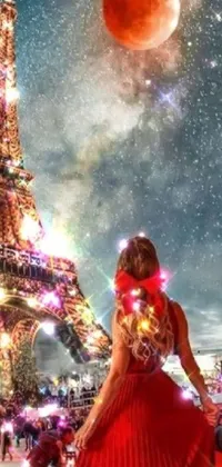 Get ready to add a touch of magic to your phone screen with this stunning live wallpaper! Featuring a beautiful girl in a red dress standing in front of the Eiffel Tower, this Tumblr-inspired background is perfect for anyone who loves Parisian scenery