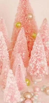 Looking for a festive live phone wallpaper that adds holiday cheer to your screen? Check out this Pink Trees wallpaper by Suzy Rice