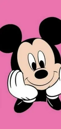 This phone live wallpaper showcases a bright and playful cartoon rendition of the beloved Disney character, Mickey Mouse