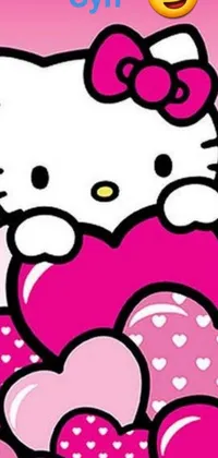 Adorn your phone screen with this delightful Hello Kitty live wallpaper! The charming cartoon character rests atop a heap of hearts, accentuating the pink-hued world
