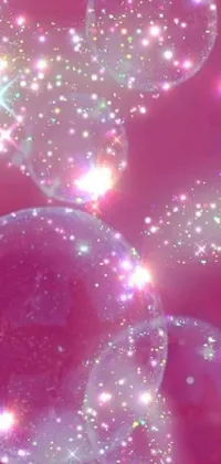 Looking for a playful and whimsical live wallpaper to add to your phone? Check out this design featuring colorful bubbles floating on a pink surface, enhanced by digital art techniques