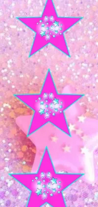 This pink glitter live wallpaper features three rotating stars on a pastel pink background