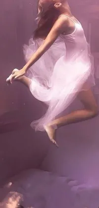 Introducing a stunning live wallpaper for your phone! This photorealistic painting features a woman in a white dress, floating in water amidst a surreal dreamscape
