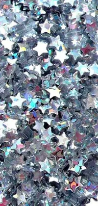 This stunning phone live wallpaper showcases a close up of confetti, creating a festive atmosphere wherever you go