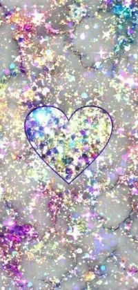 This phone live wallpaper features a stunning, close-up image of a heart on a glittery background