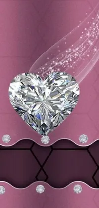 This phone wallpaper boasts a heart-shaped diamond that glimmers brightly on a soft pink background, perfect for those who love luxury and romance