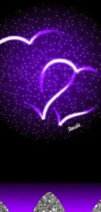 This purple live wallpaper features two hearts outlined in vibrant neon light