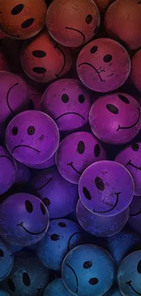 Looking for a fun and playful live wallpaper for your mobile phone? Check out the Smileys Stack wallpaper, featuring countless smiley faces piled on top of one another in a vibrant and colorful design