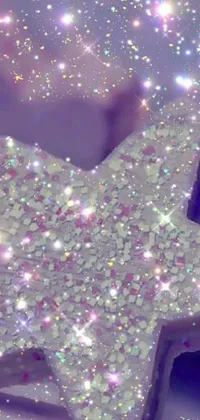 Get lost in mesmerizing digital art - a live wallpaper featuring a mystical star-shaped object amidst dazzling purple sparkles
