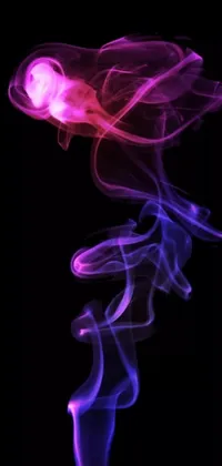 Embrace the magic of digital art with this mesmerizing live wallpaper for your iPhone! The wallpaper features a captivating close-up of swirling smoke, set against a bold black background